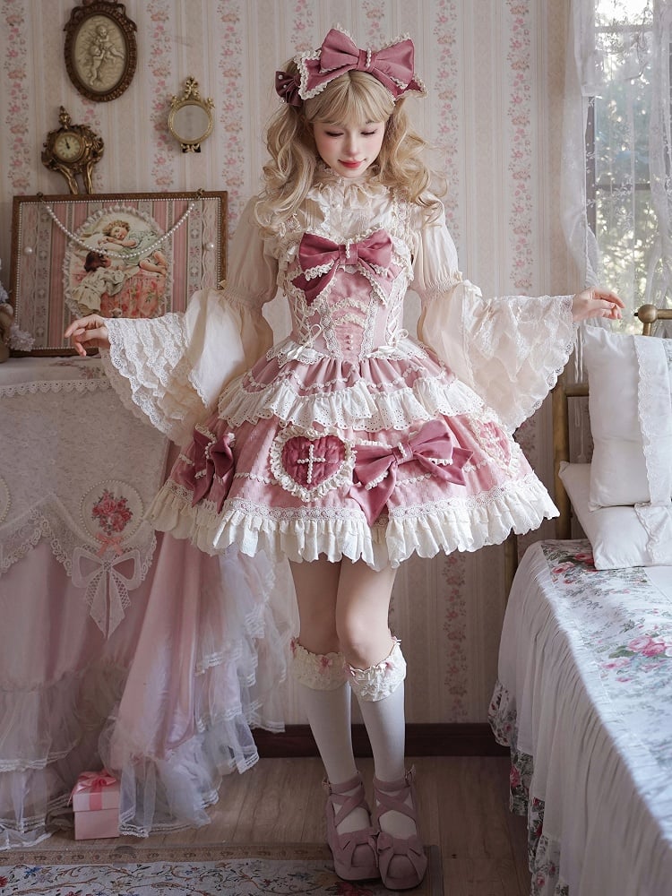 ピンクの蝶結びとハート型のアップリケスカートのスイートロリータドレス