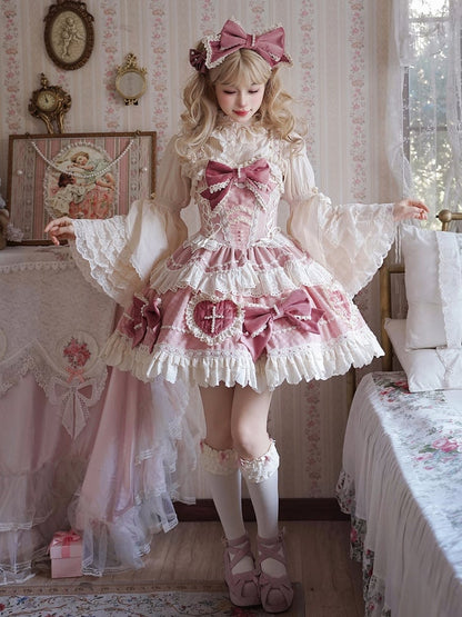 ピンクの蝶結びとハート型のアップリケスカートのスイートロリータドレス