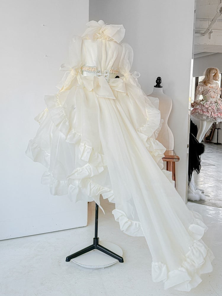 Hellgelbes, transparentes Oberteil mit langen Ärmeln und kaskadierendem Rüschensaum