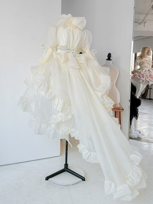 Hellgelbes, transparentes Oberteil mit langen Ärmeln und kaskadierendem Rüschensaum