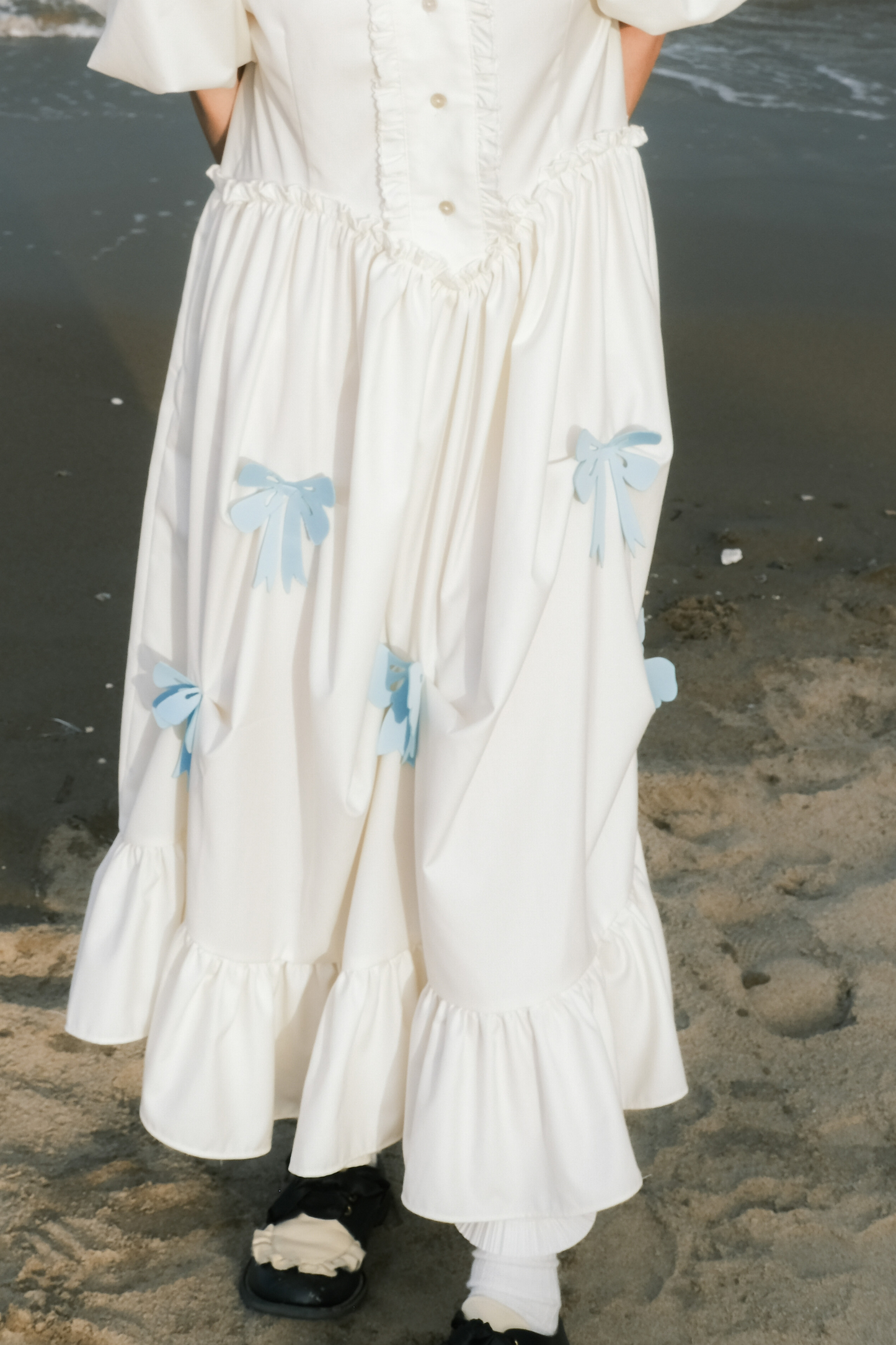 Prinzessinnenkleid mit Ballonärmeln und Schleife