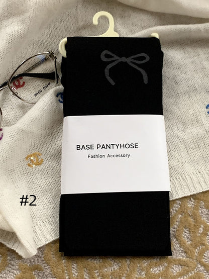 蝶結び柄タイツ