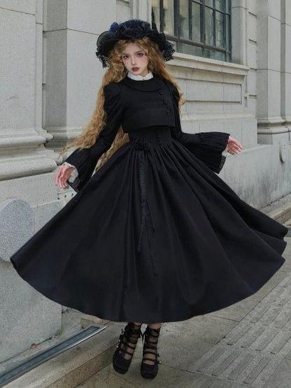 Schwarzes Cropped-Top mit Hammelkeulenärmeln