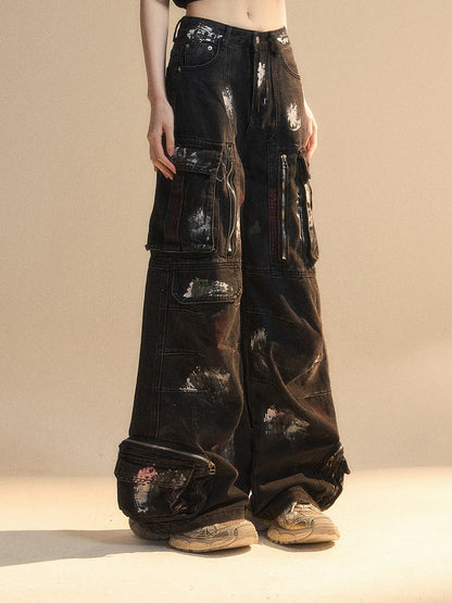 Reißverschlussdetails, Spray Black Pockets, Cargo-Print, Distressed Paint, Wide-Leg-Jeans