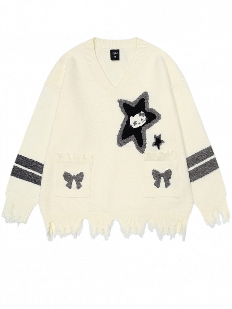 Pull col V à bordure vieillie avec motif chaton et étoile abricot