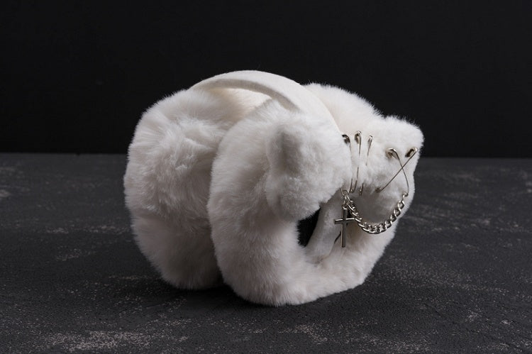 白いハンドメイドのクロスアンドピンとプラッシュボーンのイヤーマフ