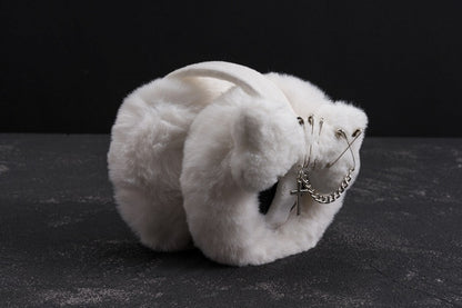 白いハンドメイドのクロスアンドピンとプラッシュボーンのイヤーマフ