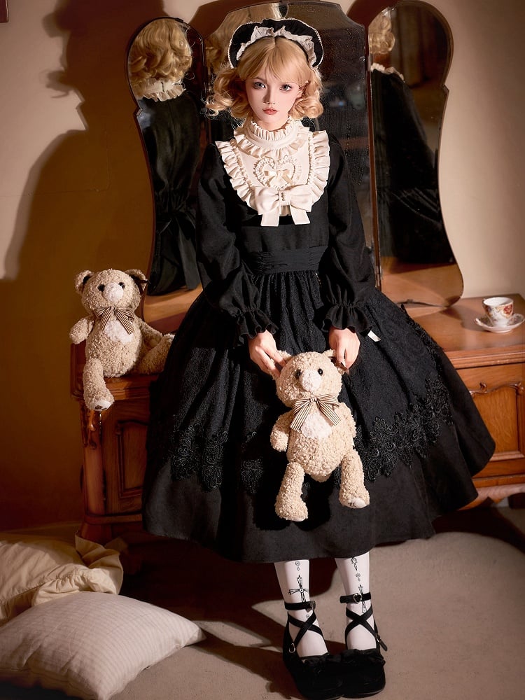 Schwarze Spitzenschürze mit Pompom-Anhänger