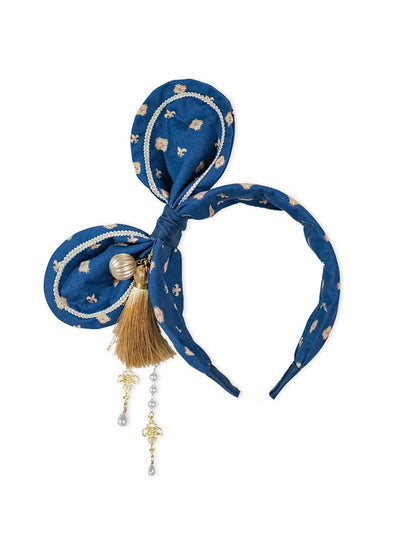 Ear-Shaped Bow Headpiece with Chain and Tassel Accents - Crucis Universal Tailor Company