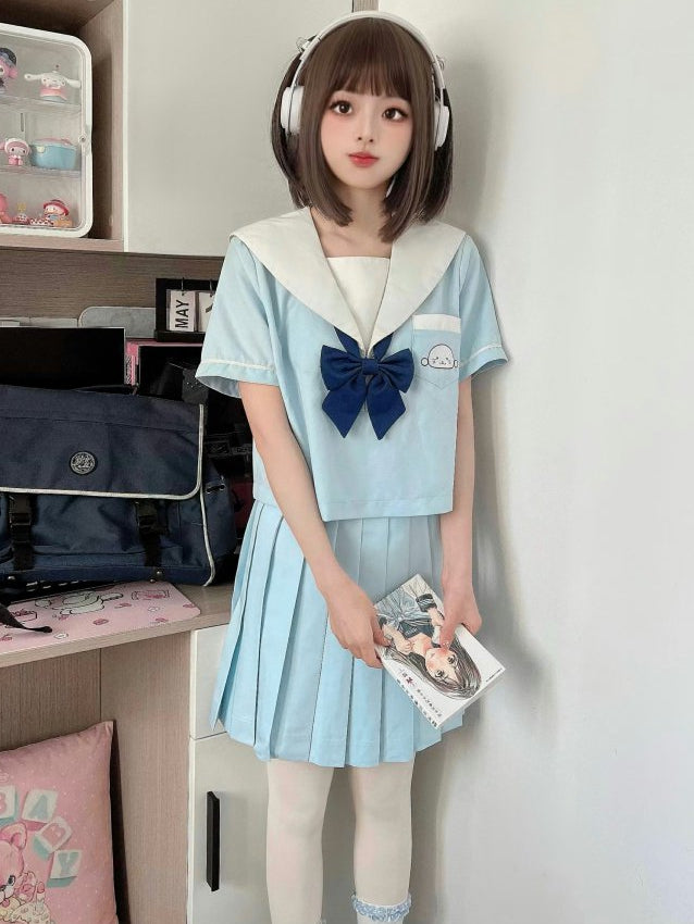 Little Seal Hellblaues JK-Uniform-Oberteil mit Matrosenkragen und gratis Fliege