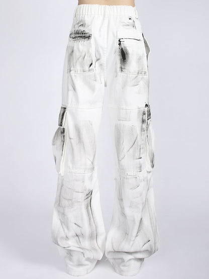 Vintage-Cargojeans in Weiß mit Farbspritzern und Batikmuster, lockere Passform, mit Kordelzug in der Taille