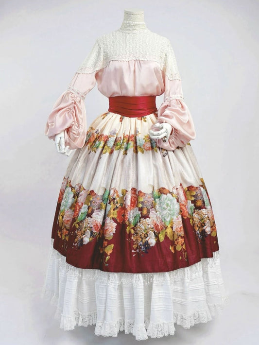 ピンクのブラウス、ワインレッドのクリスタルタッセル、花柄スカートセット