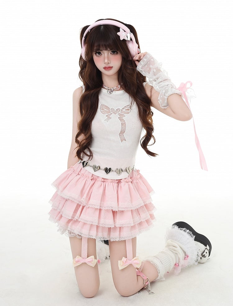 華やかなタンクトップ ホワイト 蝶結び型カットアウト