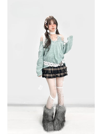 ミントグリーンのホルターネックフェイクツーピースニットセーター