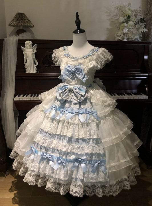 Hime Lolita-Rock mit Schleifen und blaues Hanayome-Stufenkleid mit weißer Dekoration