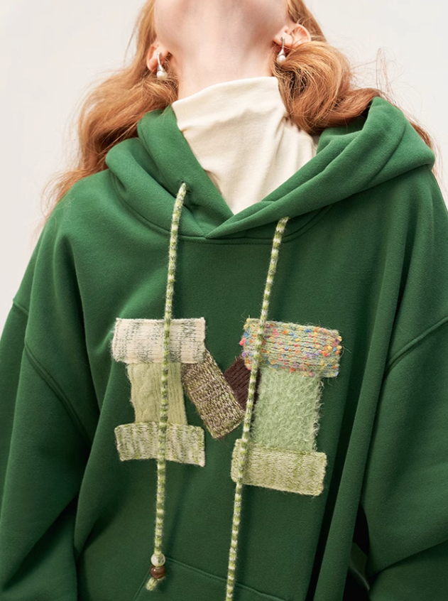 Lockerer Kapuzenpullover aus Wolle mit Logo und Spleiß