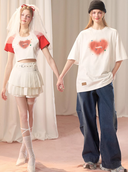 Kurzes über zweifarbigem Top + langem Schmuck