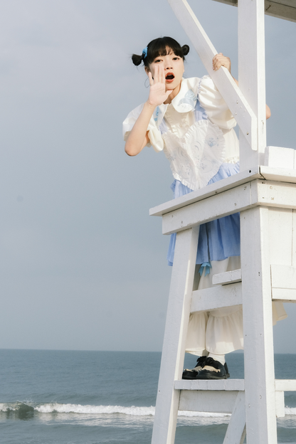 Prinzessinnenkleid mit Ballonärmeln und Schleife