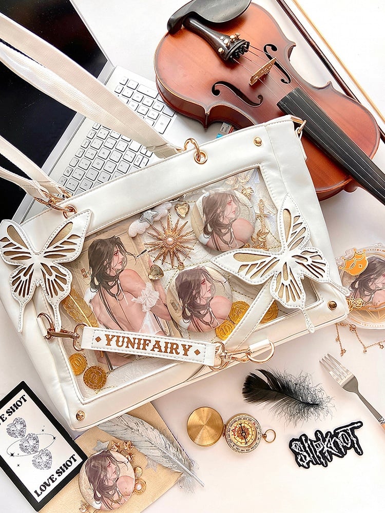 Abnehmbare Ita-Umhängetasche in Gold mit Schmetterlings- und Spinnennetz-Detail in Weiß