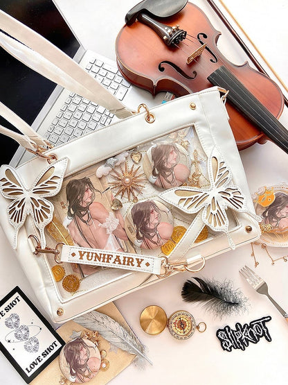 Abnehmbare Ita-Umhängetasche in Gold mit Schmetterlings- und Spinnennetz-Detail in Weiß