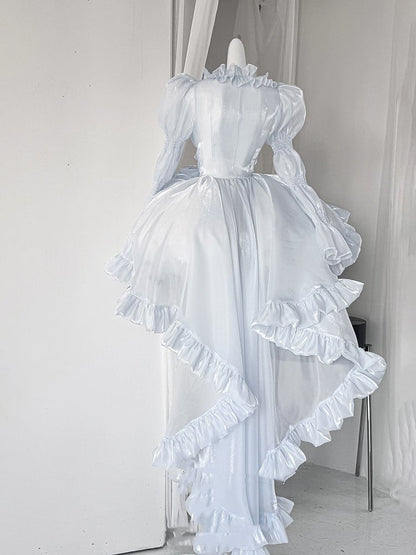 フリル付きロング丈トップス、袖はシアー、裾はカスケーディングヘム、ブルー