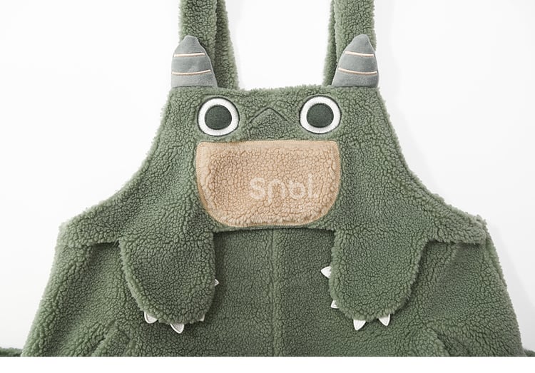 かわいい恐竜の緑のぬいぐるみオーバーオール