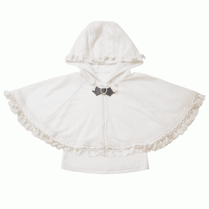 ベージュのボヘミアンタッセルヘムジップアップケープとキャミトップセット