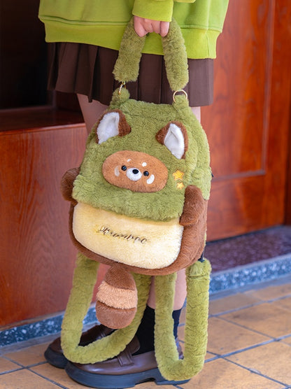 緑と茶色のかわいいレッサーパンダのぬいぐるみバックパック