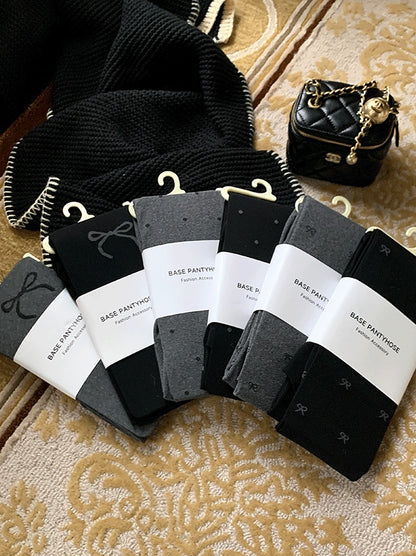 蝶結び柄タイツ