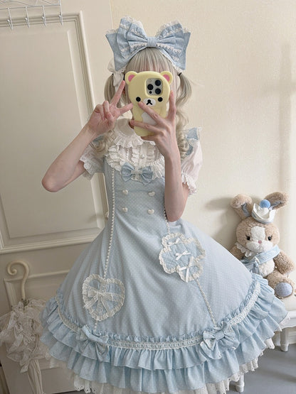 Blaues Lolita-Kleid mit Rüschensaum und Lagenmuster und Polka-Dot-Muster