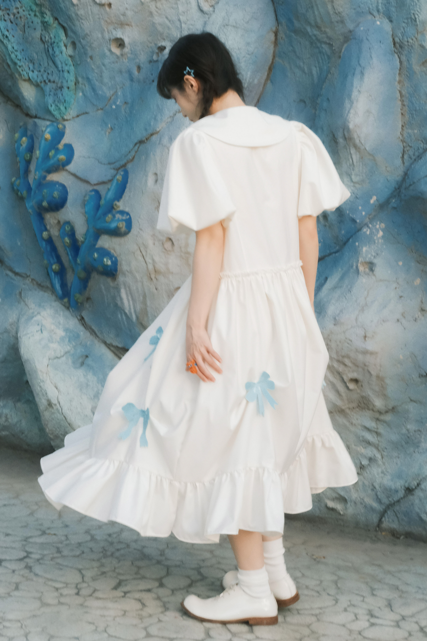 Prinzessinnenkleid mit Ballonärmeln und Schleife