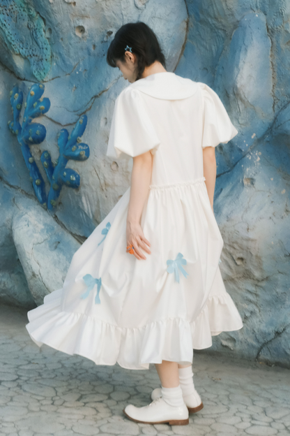 Prinzessinnenkleid mit Ballonärmeln und Schleife