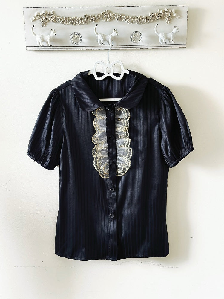 Bluse schwarz elastisch gestreift und kurze goldene Manschetten Stoffärmel