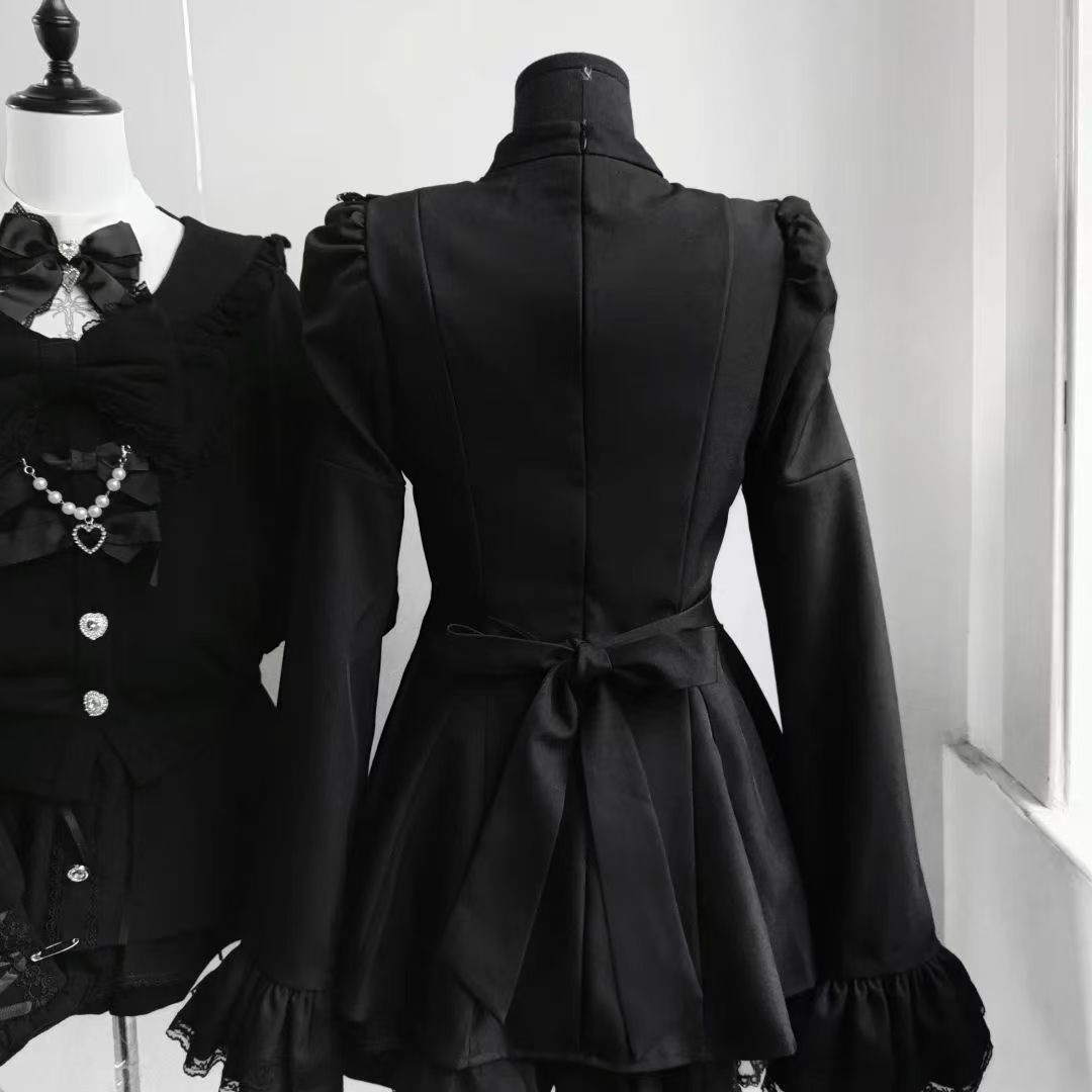 Back view of black gothic Lolita lace mini dress with waist tie