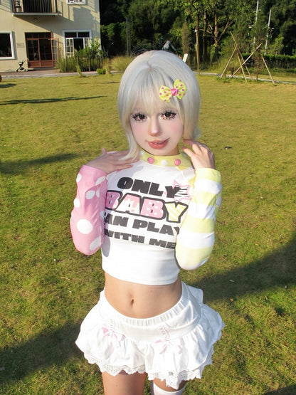 Gelb-pinkes, langärmliges, kurzes Oberteil mit Buchstaben