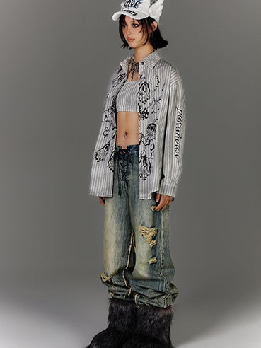 ダメージ加工のオーバーサイズシルエットのグラフィティシャツ ブラック ホワイト ストライプ