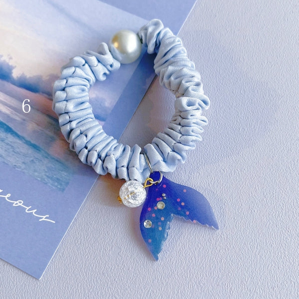Perlenbesetzter 7 Meerjungfrau Charm Optionen Blaues Haargummi verziert