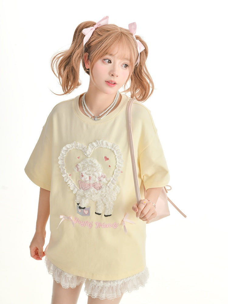 イエローのプラッシュラムアップリケフリルハートルーズTシャツクリーミー