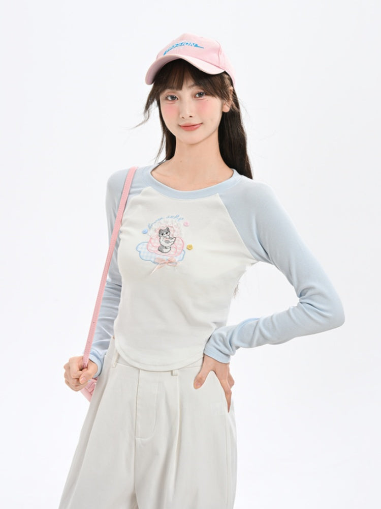 Haut brodé chaton de dessin animé, design colorblock bleu et blanc