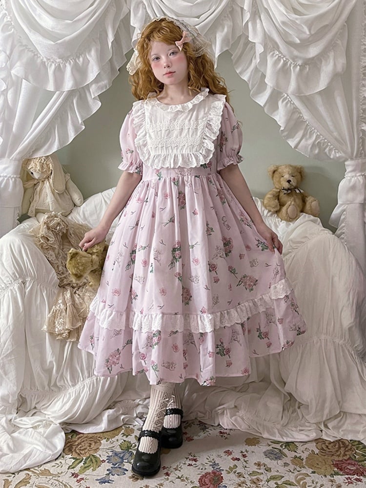 Rosa Hauskleid mit Puffärmeln und Blumendruck