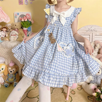 Blaue Taschen Herzförmiges süßes Kleid Bowknots Plaid Flatterärmel Licht