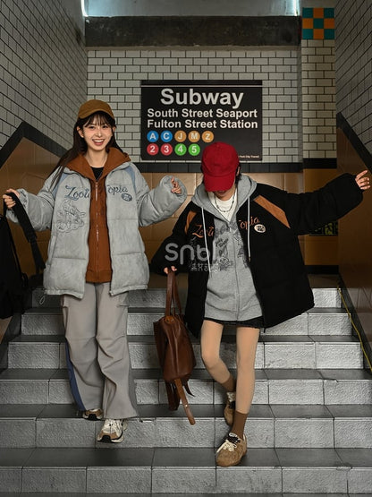 Schwarze Pufferjacke mit „Zootopia Judy and Nick“-Applikation