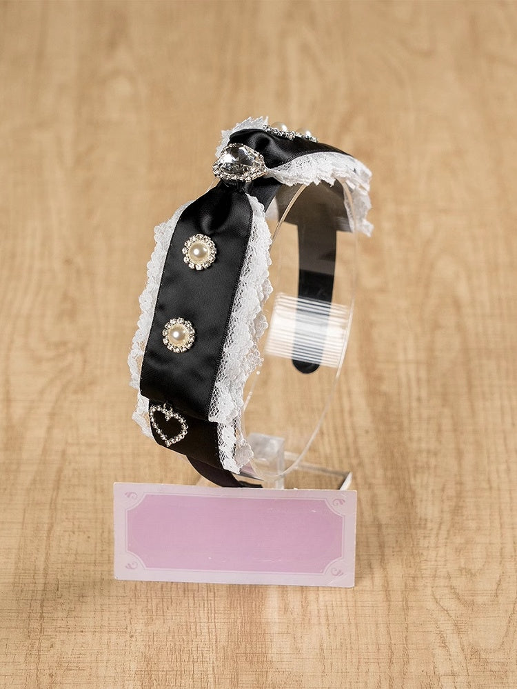 ジライケイ ラインストーンとビーズで飾られたレーストリム 蝶結び KC