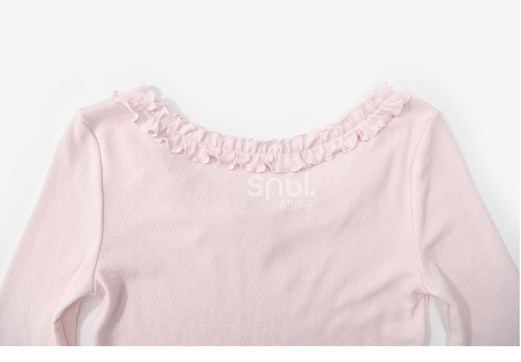 Rosafarbenes, langärmliges Oberteil mit Rüschenbesatz und Schleifendetails