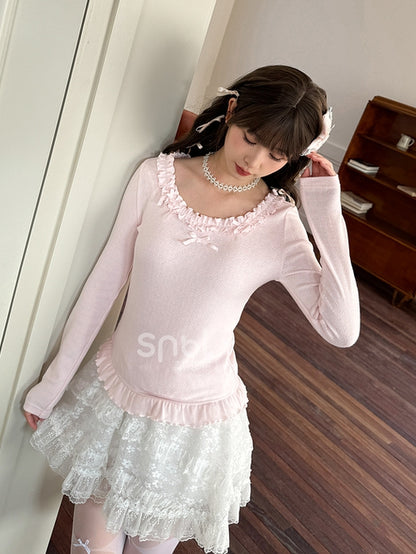 Rosafarbenes, langärmliges Oberteil mit Rüschenbesatz und Schleifendetails