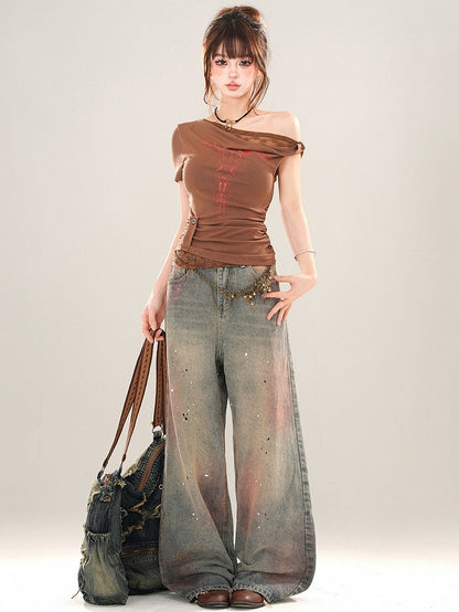 Jeans mit weitem Bein in verblasster Waschung und SplashInk-Details in Blau und Pink