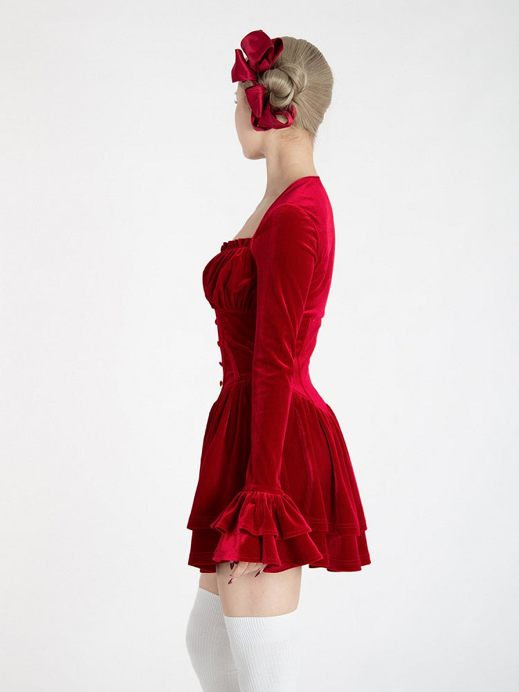 Glamouröses Minikleid aus rotem Samt mit V-Ausschnitt und Glockenärmeln und Stufenrock