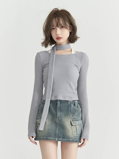 Runder, niedriger Strickschal