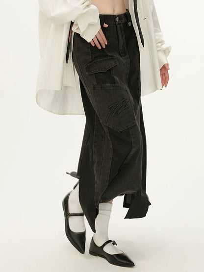 Schwarzer asymmetrischer Jeansrock aus Leder