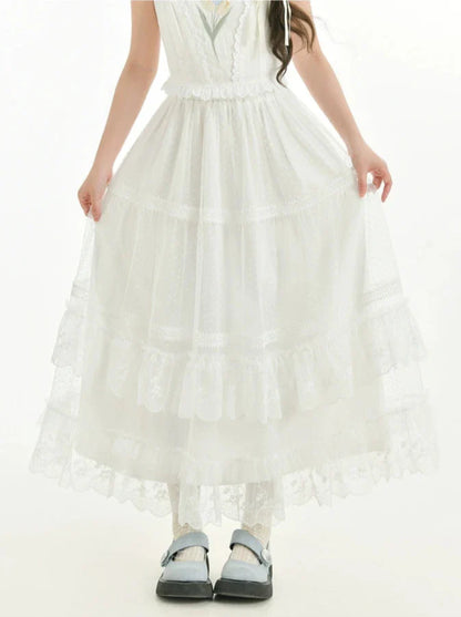 フェアリー風透かし編みニットカーディガン + キャミソールトップス + ロングケーキスカート